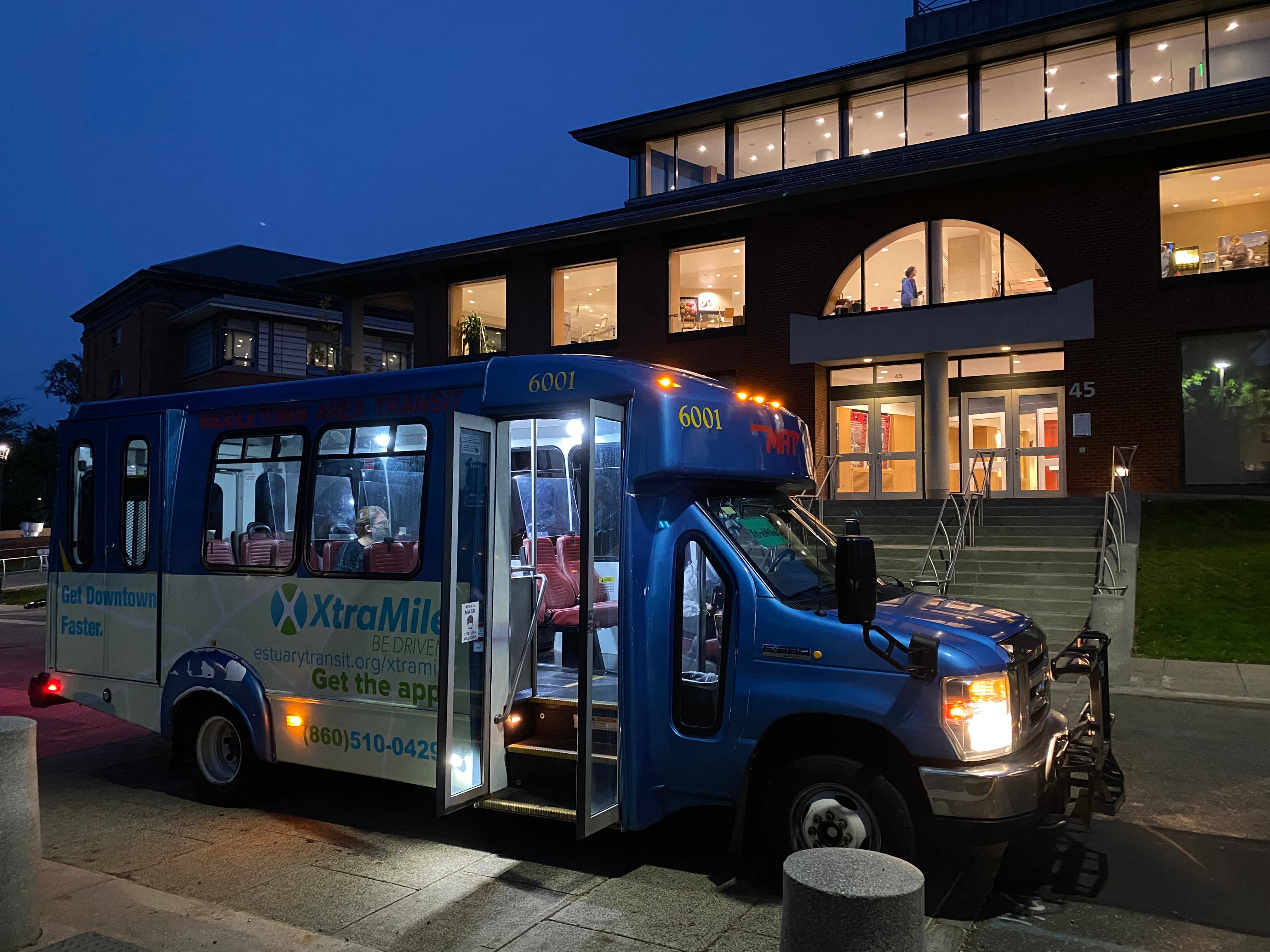 Xtramile Shuttle Bus outside Usdan
